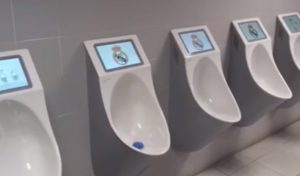 TV Screens installed at Real Madrid's Stadium Urinals