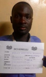 Mr. Willy Wanyoni of Moi Girls Kamusinga after his arrest for defiling a student at the school