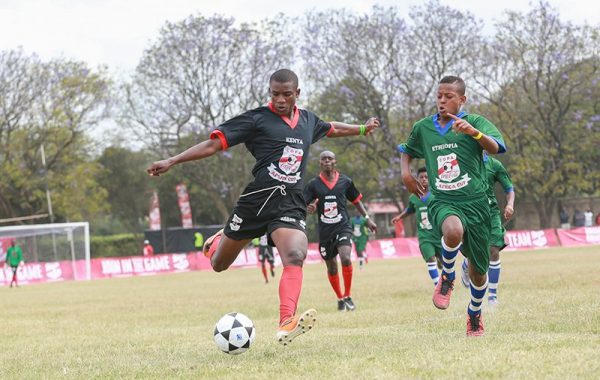 Kenya's representatives at this year's inaugural Copa coca cola Africa Soccer championship, St. Anthony's Boys- Kitale in black kits, in action against Ethiopia today. Kenya won 11-1