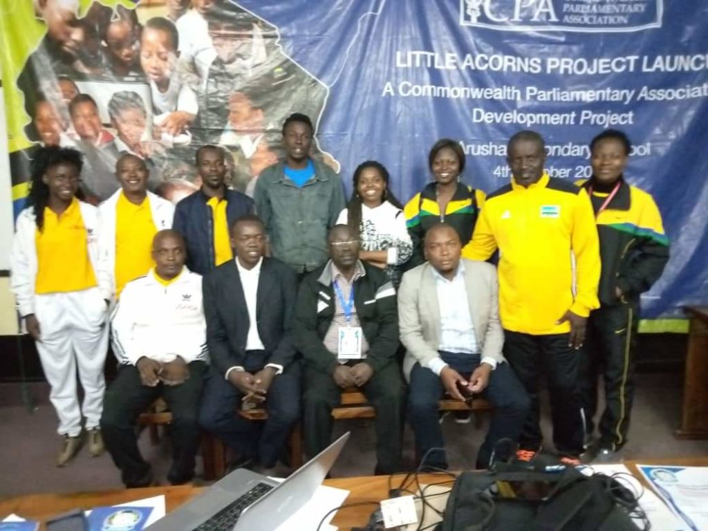 The FEASSSA Secretariat Team after concluding their work in the 2019 games in Arusha, Tanzania (Seated Centre; in specs, is Mr. George Omondi the FEASSSA Vice Secretary General).