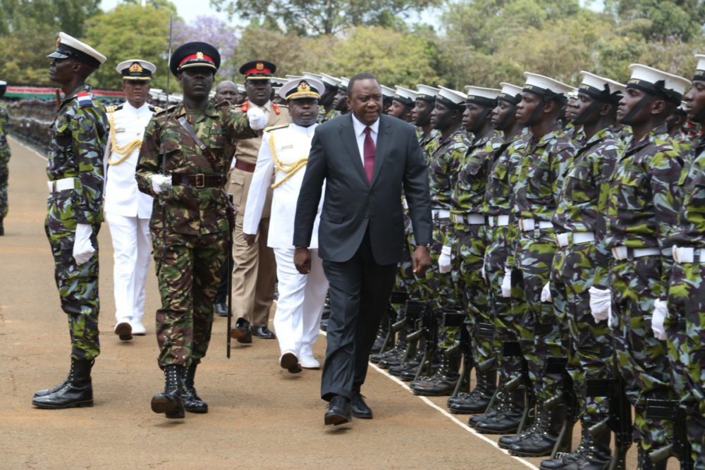 File photp- president Kenya inspects a gurad of honour parade during a recent pass out ceremony for recruits