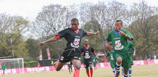Kenya's representatives at this year's inaugural Copa coca cola Africa Soccer championship, St. Anthony's Boys- Kitale in black kits, in action against Ethiopia today. Kenya won 11-1