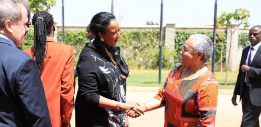 Education Cabinet Secretary, Dr Amina Mohammed; left, welcomes the first Lady, Margret Kenyatta, at BrookHouse School, Runda Campus on Thursday last week for the Margaret Kenyatta Scholarship Award and the opening of the BrookHouse School Runda Campus Library. The Education Ministry has stepped up efforts to ensure all learners go to school