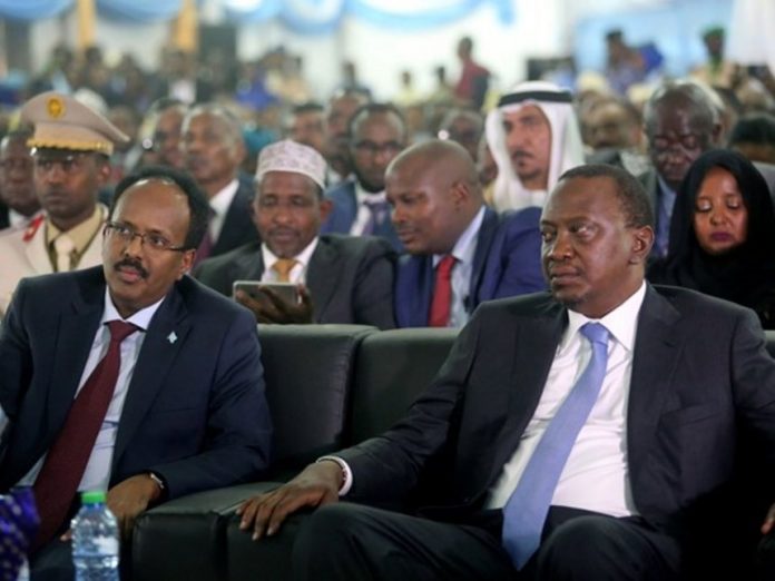 Somalia Head of State, Mohamed Abdullahi Mohamed, and his Kenyan Counterpart, Uhuru Kenyatta, at a past international event. Kenya has declared her northern neighbour, Somalia, an enemy state for allegedly auctioning oil and gas blocks falling within the Kenyan maritime territory near its border early this month. Somalia Head of State, Mohamed Abdullahi Mohamed, and his Kenyan Counterpart, Uhuru Kenyatta, at a past international event. Kenya has declared her northern neighbour, Somalia, an enemy state for allegedly auctioning oil and gas blocks falling within the Kenyan maritime territory near its border early this month.