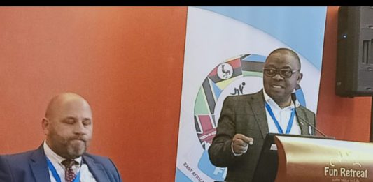 FEASSSSA president, Mr Justus Mugisha, makes his presentation at the body's Symposium held in Arusha, Tanzania, on 19th August, 2019. The president has announced the change of the body's name to Federation of East Africa School Sports Associations (FEASSA).